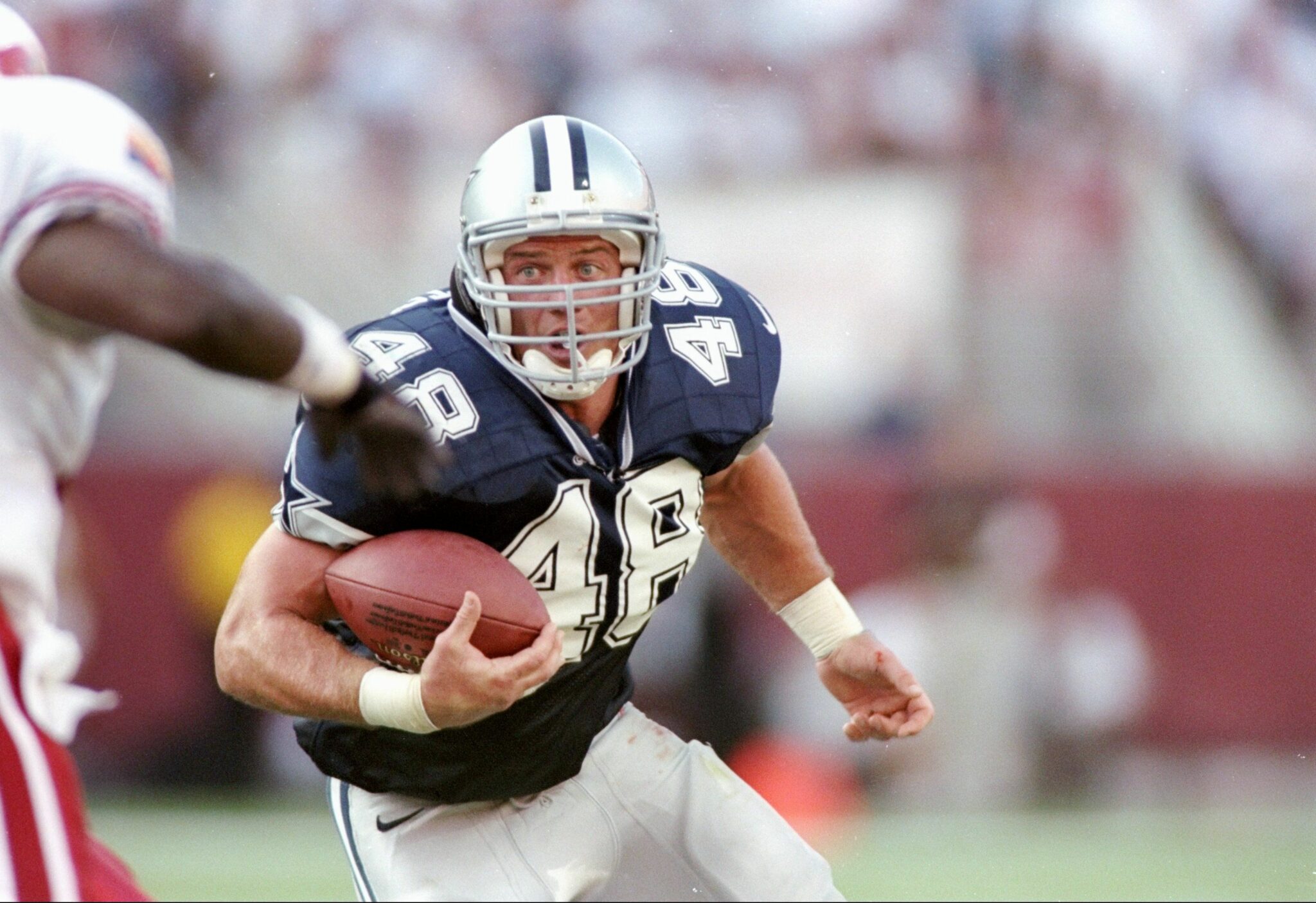 7 Sep 1997: Running back Daryl Johnston #48 of the Dallas Cowboys carries the football during the Cowboys 25-22 loss to the Arizona Cardinals at Sun Devil Stadium in Tempe, Arizona. Mandatory Credit: Jed Jacobsohn /Allsport