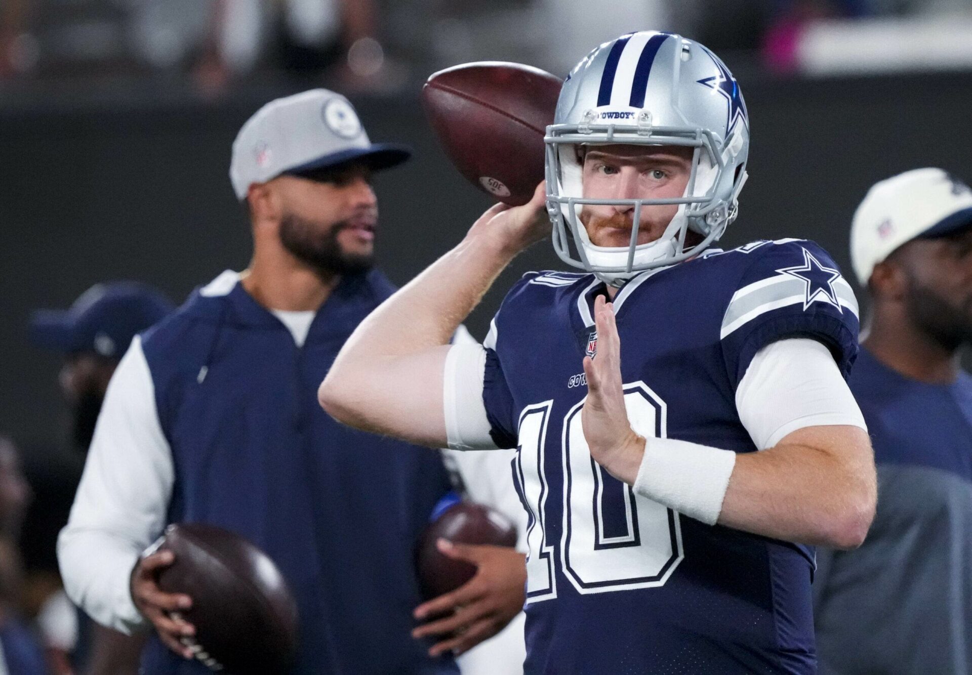 Sep 26, 2022; East Rutherford, New Jersey, USA; Dallas Cowboys quarterback Cooper Rush (10) warms up in front of quarterback Dak Prescott before the game against the New York Giants at MetLife Stadium. Mandatory Credit: Robert Deutsch-USA TODAY Sports