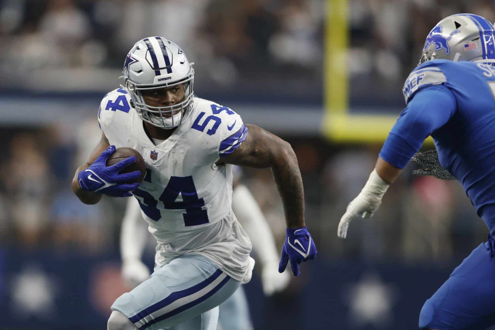 Oct 23, 2022; Arlington, Texas, USA; Dallas Cowboys defensive end Sam Williams (54) runs with the ball after recovering a fumble in the fourth quarter against the Detroit Lions at AT&T Stadium. Mandatory Credit: Tim Heitman-USA TODAY Sports