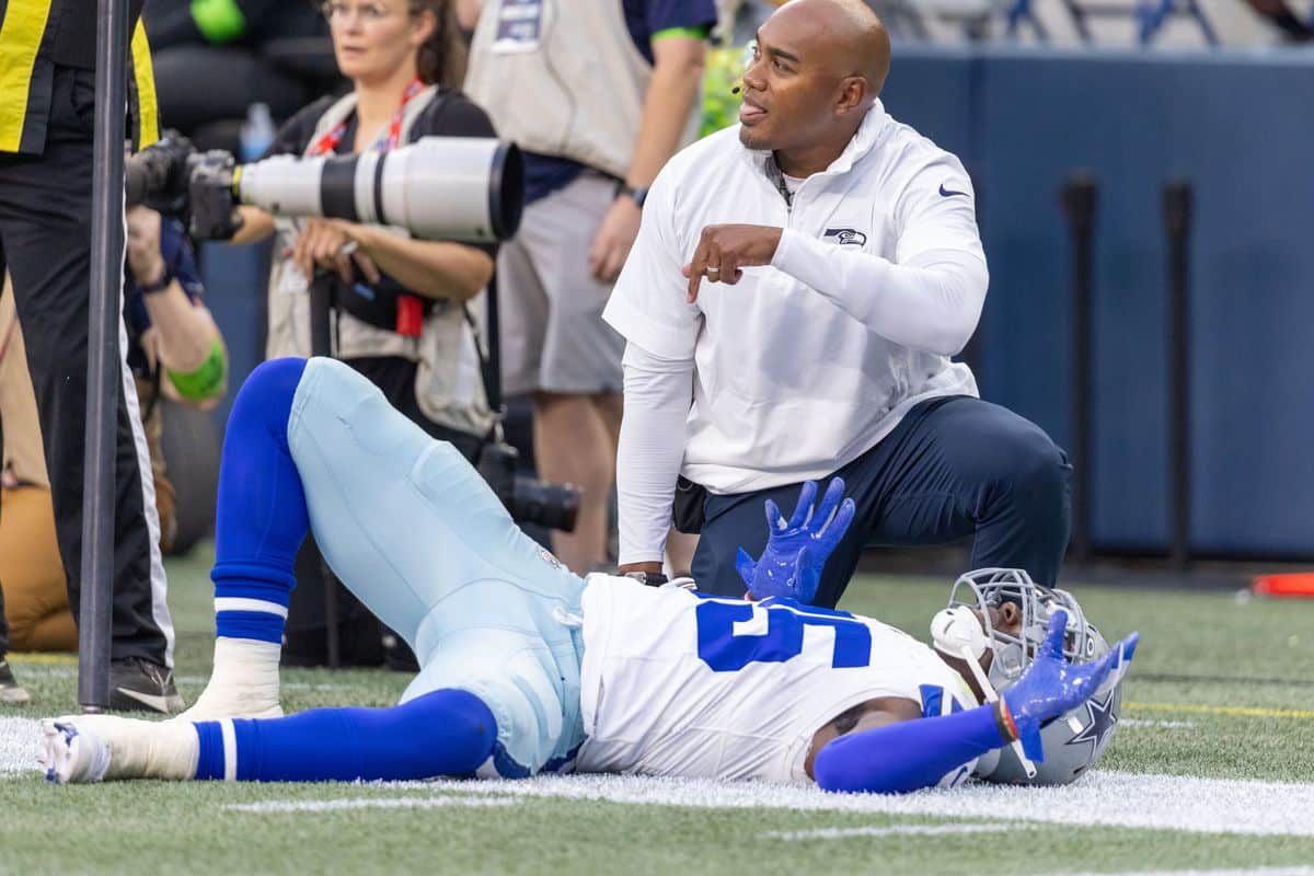 Cowboys rookie LB DeMarvion Overshown awaits medical attention after tearing his anterior cruciate ligament in a preseason game in Seattle on August 19, 2023