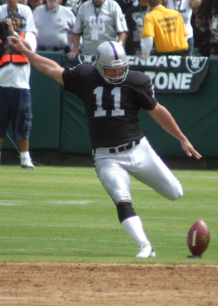 Oakland Raiders kicker Sebastian Janikowski prepares to kick off against the Detroit Lions in this 2007 game. (Photo by Richard Paolinelli)